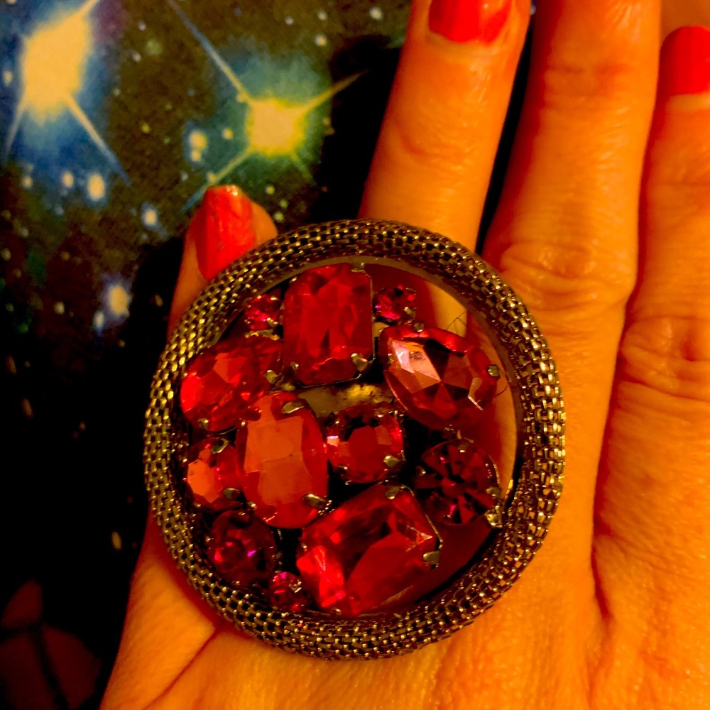 Betsey Johnson ring skies in size 8.5, but can be adjusted bigger and smaller